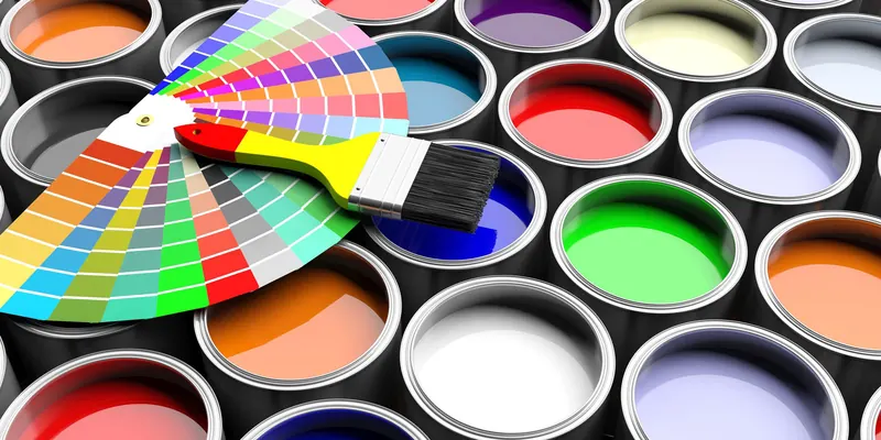 Botes de pintura de colores y carta de colores